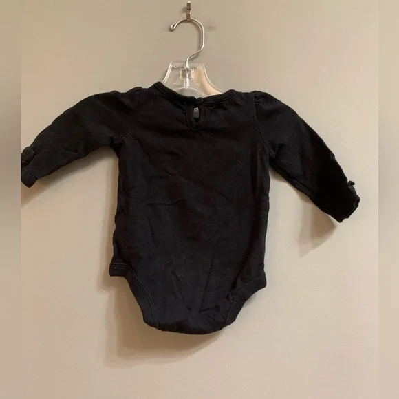 Baby onesie with a printed necklace